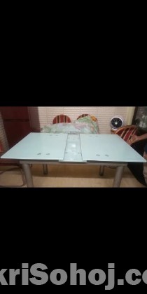 Sliding dining table